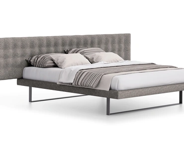 Letto Maya con testiera imbottita di Spagnol Mobili