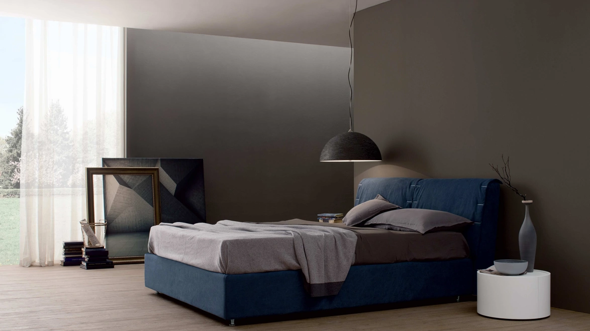 Letto in tessuto imbottito con testiera London di Spagnol Mobili