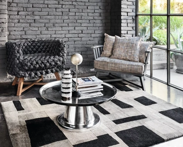 Poltroncina Gray imbottita di Gervasoni
