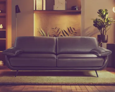 Divano lineare in pelle con piedini in metallo Regal_e di Calia