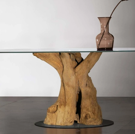 Tavolo Sequoia con basamento in radice di teak, top in vetro trasparente e base in metallo di Nature Design